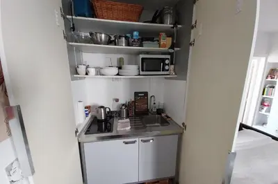 Cuisine ou kitchenette dans l'établissement Studio for 2 - near Louvre Museum