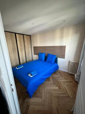 Un ou plusieurs lits dans un hébergement de l'établissement Very luxurious apartment in Paris - 10 min de la tour eiffel