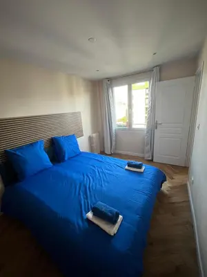 Un ou plusieurs lits dans un hébergement de l'établissement Very luxurious apartment in Paris - 10 min de la tour eiffel