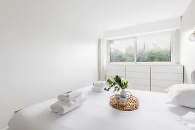 Un ou plusieurs lits dans un hébergement de l'établissement A haven of peace in Neuilly sur Seine