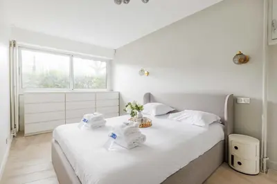 Un ou plusieurs lits dans un hébergement de l'établissement A haven of peace in Neuilly sur Seine