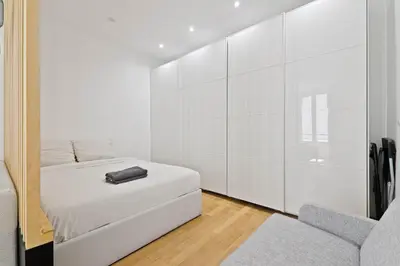 Un ou plusieurs lits dans un hébergement de l'établissement 1 Bedroom Apartment - 6P - Republique, Paris
