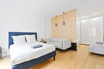 Un ou plusieurs lits dans un hébergement de l'établissement 1 Bedroom Apartment - 6P - Republique, Paris