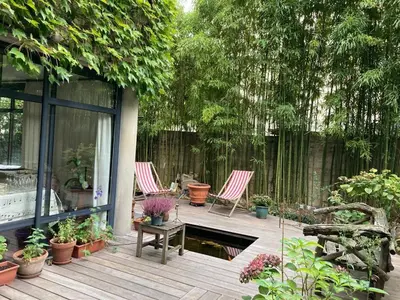 Jardin de l'établissement Garden Studio Les Bambous