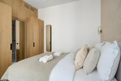 Un ou plusieurs lits dans un hébergement de l'établissement Luxurious and tranquil studio - Opéra - AC