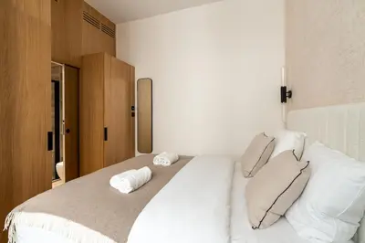 Un ou plusieurs lits dans un hébergement de l'établissement Luxurious and quiet studio - Opéra - Air conditioning