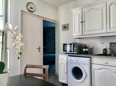 Cuisine ou kitchenette dans l'établissement Appartement Montmartre Sacré-Cœur