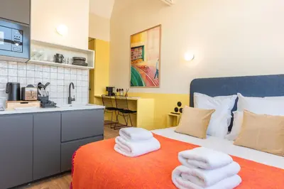 Un ou plusieurs lits dans un hébergement de l'établissement Maison Delage