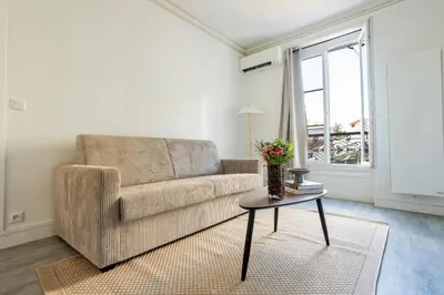 Coin salon dans l'établissement 1 Chambre rue du 14 juillet