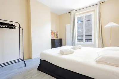 Un ou plusieurs lits dans un hébergement de l'établissement 1 Chambre rue du 14 juillet