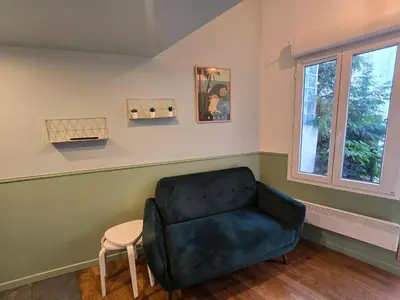 Coin salon dans l'établissement 6G- Studio cosy Issy-les-Moulineaux - Porte de Versailles