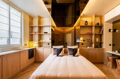 Un ou plusieurs lits dans un hébergement de l'établissement Studio moderne tout confort aux portes de Paris à Saint-Ouen