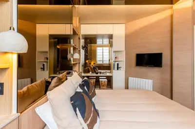 Télévision ou salle de divertissement dans l'établissement Studio moderne tout confort aux portes de Paris à Saint-Ouen