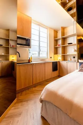 Un ou plusieurs lits dans un hébergement de l'établissement Studio moderne tout confort aux portes de Paris à Saint-Ouen