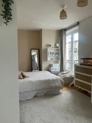 Un ou plusieurs lits dans un hébergement de l'établissement Appartement Terasse View Paris