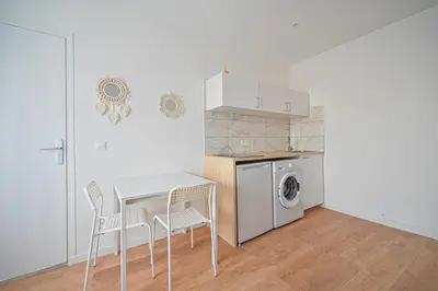 Cuisine ou kitchenette dans l'établissement Appartement Cosy Neuf