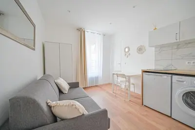 Cuisine ou kitchenette dans l'établissement Appartement Cosy Neuf