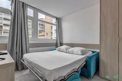 Un ou plusieurs lits dans un hébergement de l'établissement Appartement pour 4 - Parc Expo P de Versailles