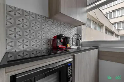 Cuisine ou kitchenette dans l'établissement Appartement pour 4 - Parc Expo P de Versailles