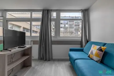 Télévision ou salle de divertissement dans l'établissement Appartement pour 4 - Parc Expo P de Versailles