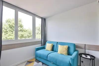 Coin salon dans l'établissement Apartment for 2 Parc Expo Porte de Versailles