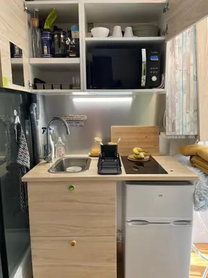 Cuisine ou kitchenette dans l'établissement Studette équipée de 9m2 dans le 10ème