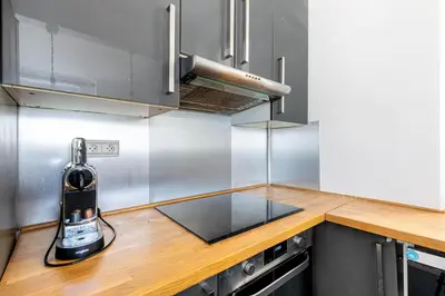 Cuisine ou kitchenette dans l'établissement GuestReady - Charming Nest near Paris