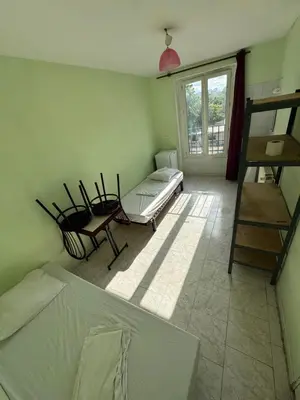 Un ou plusieurs lits dans un hébergement de l'établissement Hostel Wilson