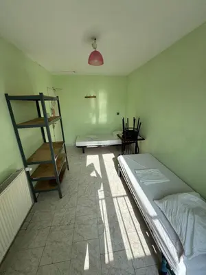 Un ou plusieurs lits dans un hébergement de l'établissement Hostel Wilson