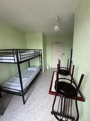Un ou plusieurs lits dans un hébergement de l'établissement Hostel Wilson