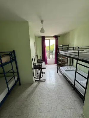 Un ou plusieurs lits dans un hébergement de l'établissement Hostel Wilson