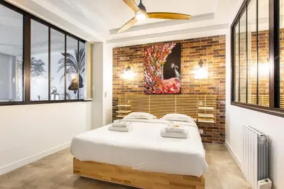 Un ou plusieurs lits dans un hébergement de l'établissement Comfortable apartment 4BR 10P Bastille Voltaire