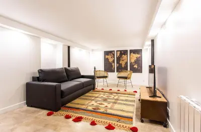 Coin salon dans l'établissement Comfortable apartment 4BR 10P Bastille Voltaire