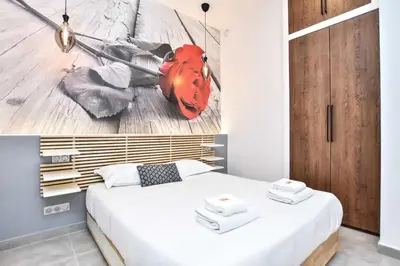 Un ou plusieurs lits dans un hébergement de l'établissement Superb apartment 3BR 8P - Nation