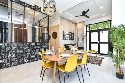 Coin salon dans l'établissement Superb apartment 3BR 8P - Nation