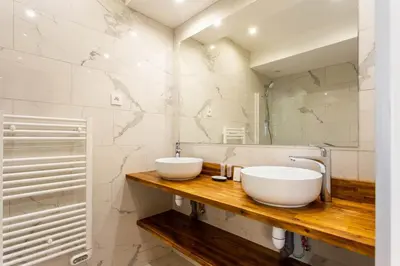 Salle de bains dans l'établissement Superbe appartement 3BR 8P - Bastille Voltaire