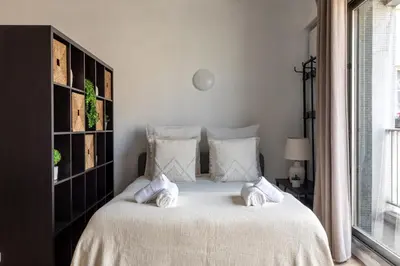 Un ou plusieurs lits dans un hébergement de l'établissement Appartement Élégant au Cœur du 16e Arrondissement