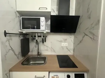 Cuisine ou kitchenette dans l'établissement Didota Chic Studio Paris14