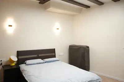 Un ou plusieurs lits dans un hébergement de l'établissement Didota Chic Studio Paris14
