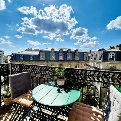 Paris rooftop retreat with sunny balcony