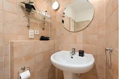 Salle de bains dans l'établissement Grand Studio au coeur du marais - 4P