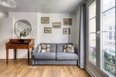 Coin salon dans l'établissement Appartement Choiseul - Welkeys