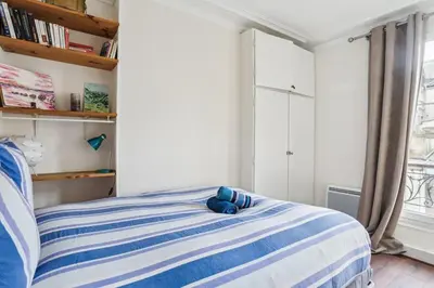 Un ou plusieurs lits dans un hébergement de l'établissement Authentique 2 Pièces - Paris 13e