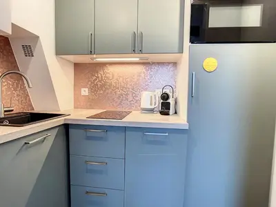 Cuisine ou kitchenette dans l'établissement Bel Appart Center of Paris vue sur tout Paris