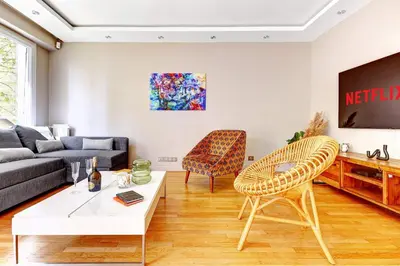 Coin salon dans l'établissement BM-Appartement chic avec terrasse - Champs-Elysees