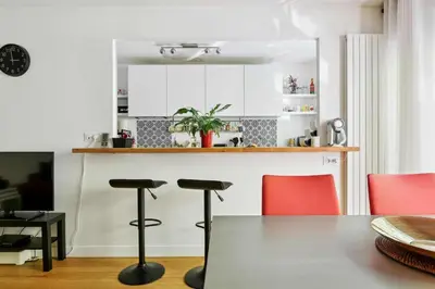 Coin salon dans l'établissement Bel appartement parisien proche Tour Eiffel