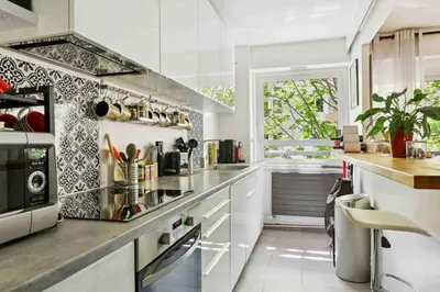 Cuisine ou kitchenette dans l'établissement Bel appartement parisien proche Tour Eiffel