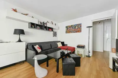 Coin salon dans l'établissement Bel appartement parisien proche Tour Eiffel