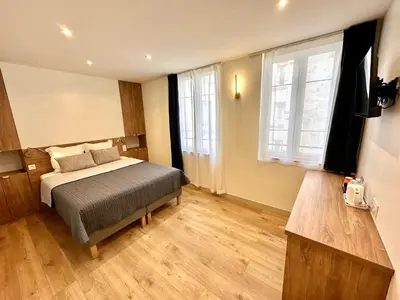Un ou plusieurs lits dans un hébergement de l'établissement Hotel Zora