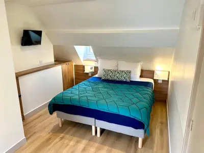 Un ou plusieurs lits dans un hébergement de l'établissement Hotel Zora